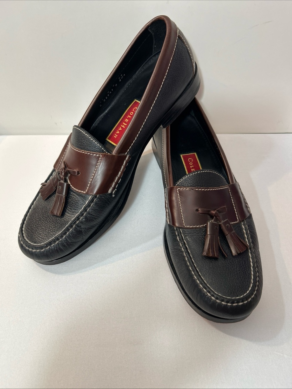 Cole Haan Black Pebbled Leather Loafers with Brown Tassel Trim